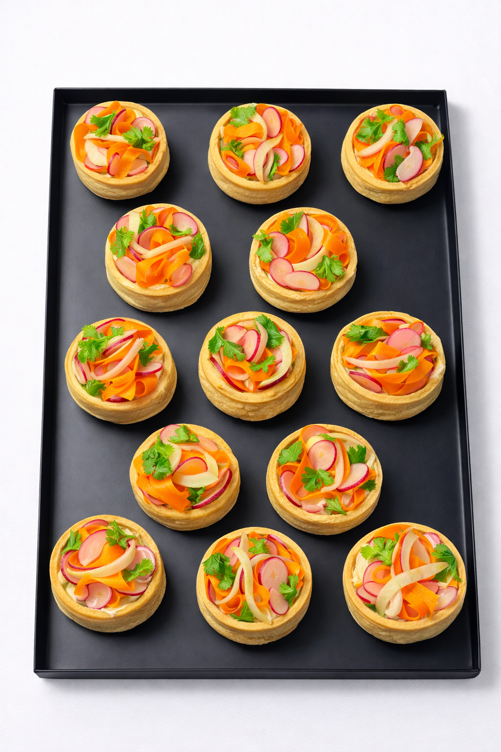 Plateau de mini tartelettes aux légumes du moment et fromage frais